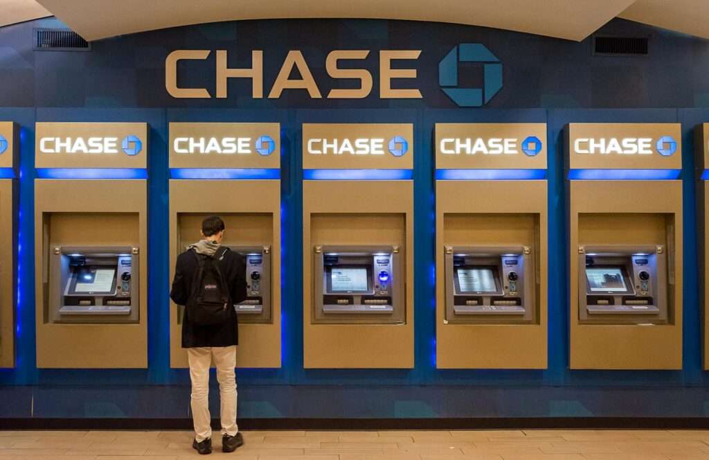 Man Standing near ATMs at chase bank