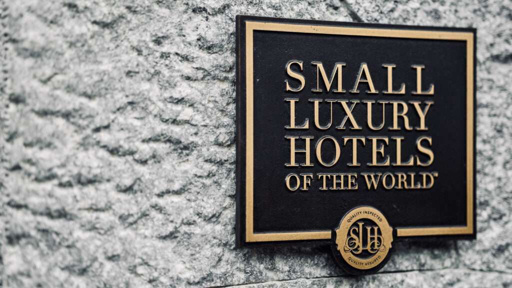 hyatt small luxury hotels front logo plaque